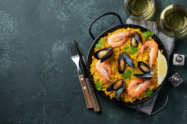 Comment préparer une paella authentique avec des ingrédients de qualité ?